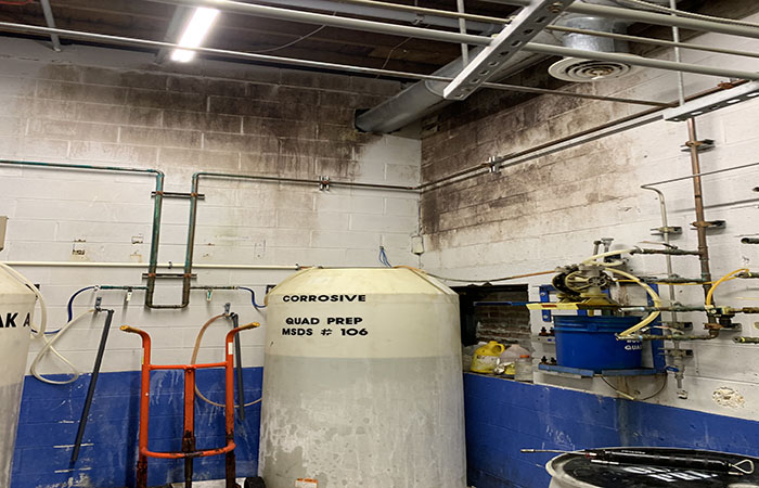 Industrial site before black mold remediation