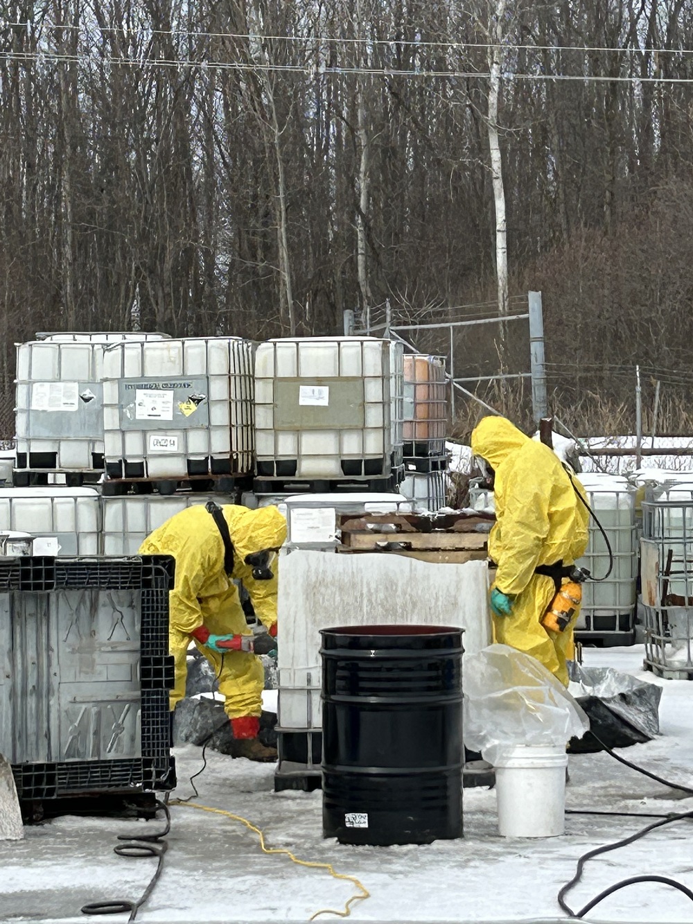 Environmental workers providing emergency spill response