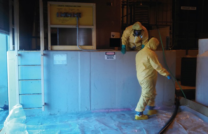 Industrial cleaning in progress inside building