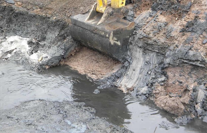 Contaminated sludge removal