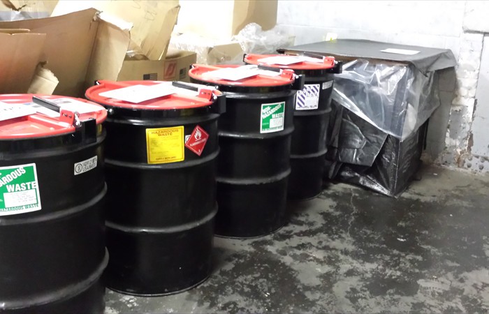 Rows of drummed waste ready for disposal