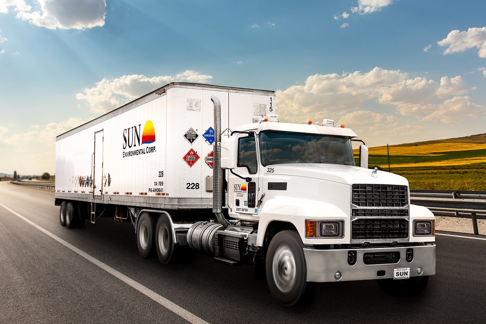 Tractor-trailer transporting waste products for recycling